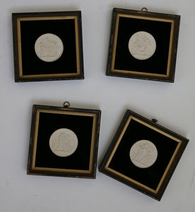 Set of four framed plaques molded after Neoclassical Danish sculptor Bertel Thorvaldsen’s “Four Seasons” entitled Childhood - Spring, Youth - Summer, Manhood - Autumn, and Old Age - Winter