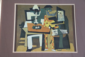 Framed Three Musicians print by Pablo Picasso